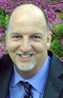 Headshot of man smiling