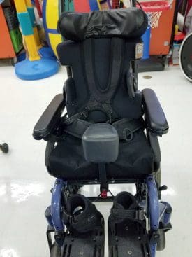 Front view of pediatric manual tilt wheelchair.