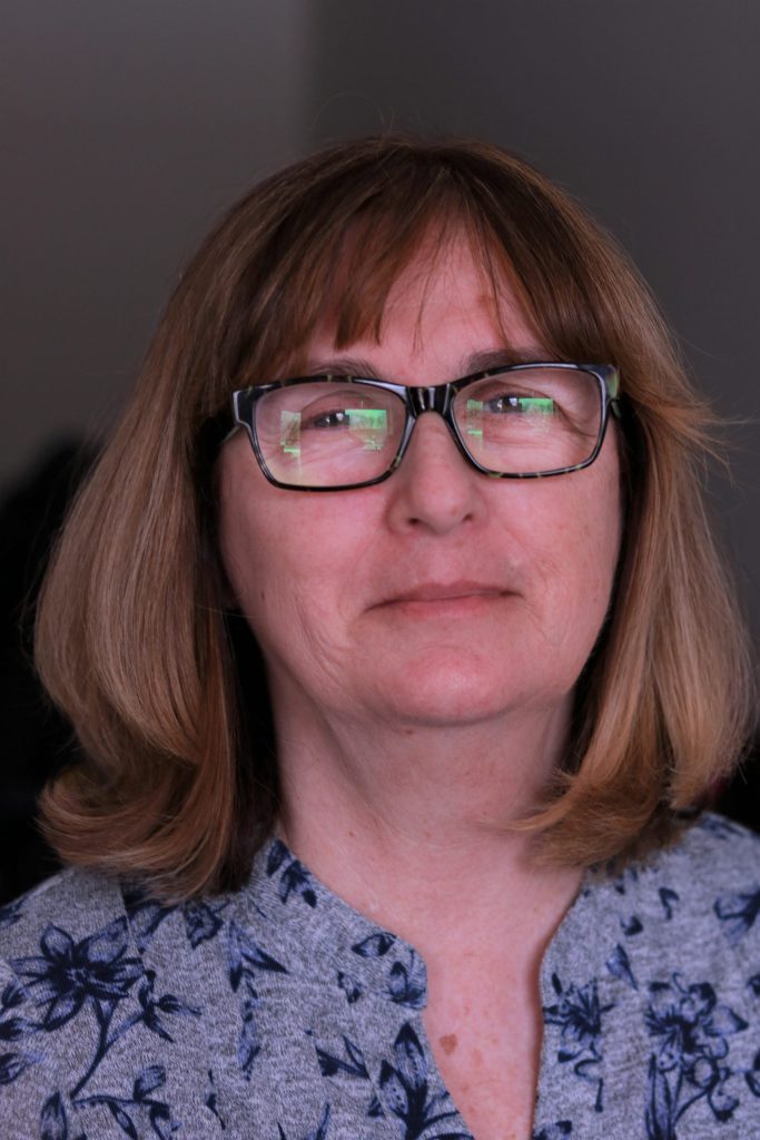 Headshot of woman wearing glasses