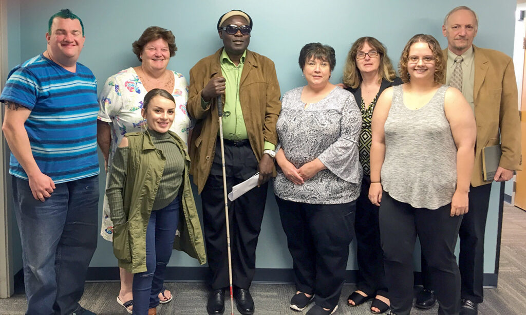 REquipment and ILCNSCA staff members posing together during a community partnership visit.